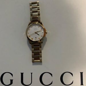Gucci
G-Timeless Goldtone Steel Bracelet Watch